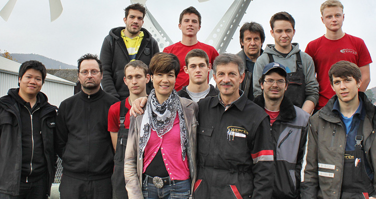 A group photo of the Wepfer family team. Anne and Hans Wepfer in the middle